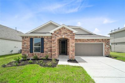 Welcome home to 1034 Valley Crest Lane located in Sunset Grove and zoned to Hitchcock ISD! | Image 1