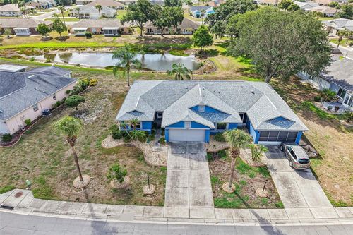 1925 Grand Cypress Ln, SUN CITY CENTER, FL, 33573-4808 | Card Image