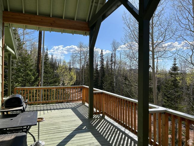 Wooden terrace with a forest view | Image 32