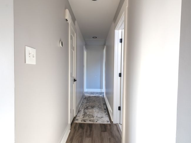 Hallway to main floor bedrooms | Image 10