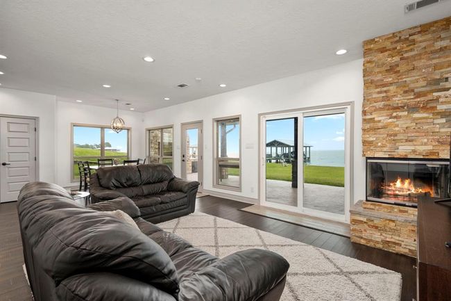Cozy up to the Fire w/ a Lake view. | Image 11