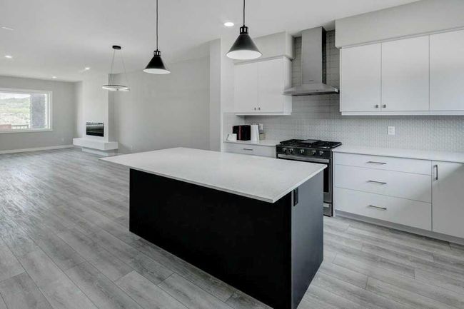 82 Edith Green Nw, Home with 4 bedrooms, 3 bathrooms and 2 parking in Calgary AB | Image 8