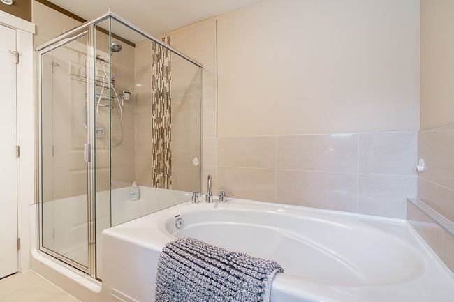 Full bath with a bath and a shower stall | Image 20