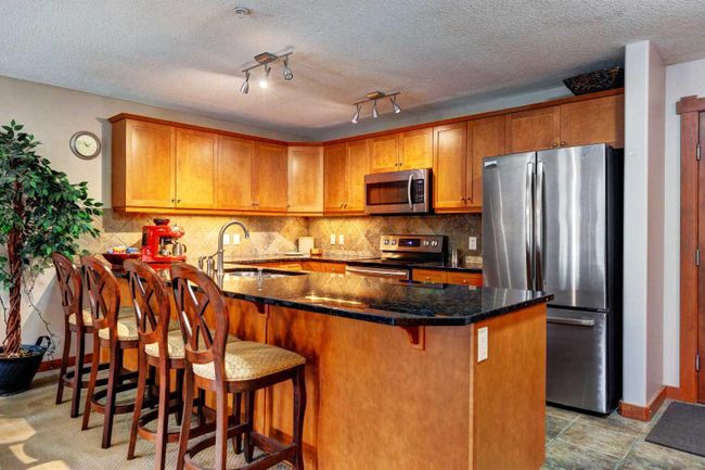 201 - 170 Crossbow Place, Home with 2 bedrooms, 2 bathrooms and 1 parking in Canmore AB | Image 6