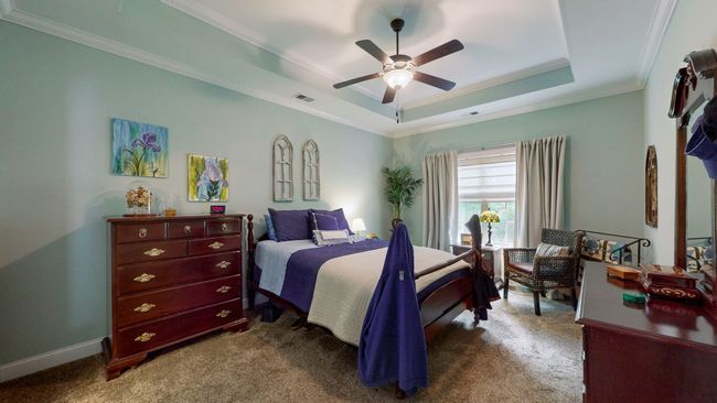 The owner's bedroom is located in the rear of the home has an en suite bathroom. | Image 15