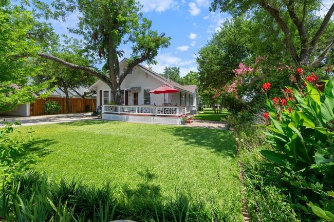 View of yard with a deck | Image 23