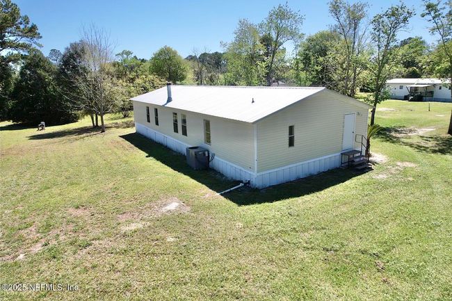 7598 Madison Dr, House other with 4 bedrooms, 2 bathrooms and null parking in Glen St. Mary FL | Image 7