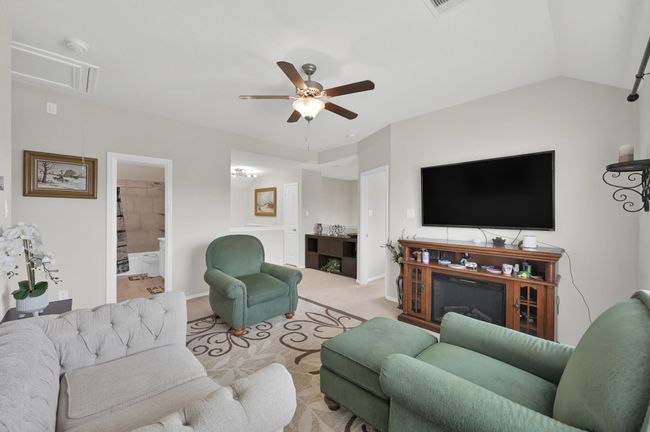 Another angle of the media room with views of adjoining rooms and bathroom. | Image 20