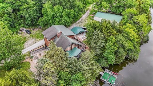 View of subject property featuring a nearby body of water | Image 63
