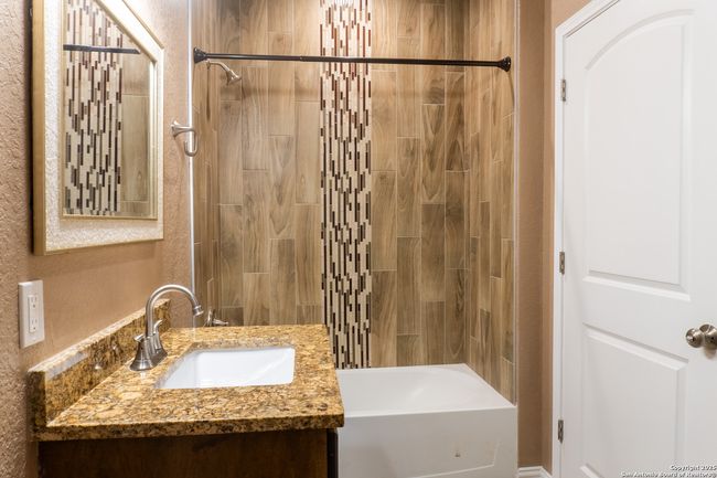 2nd Bathroom with tub, tiled floors, and vanity | Image 22