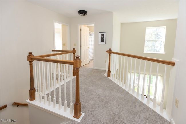 Enjoy the loft area separating bedroom spaces! | Image 27