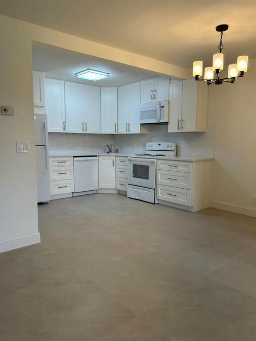 a1-205 Pine Hov Cir, Greenacres, FL, 33463-9215 | Card Image