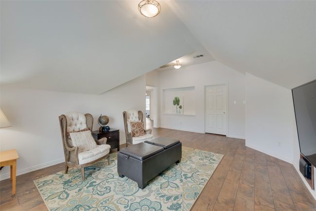 Upstairs game room with 5th bedroom access | Image 24