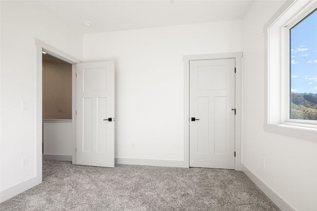 Unfurnished bedroom featuring carpet floors | Image 40