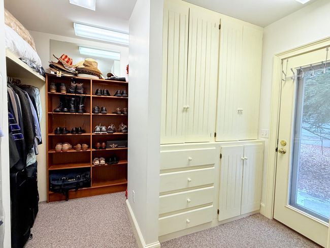 First floor primary walk in closet | Image 24