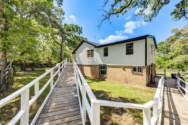 15170 Mcrae Lk, House other with 3 bedrooms, 2 bathrooms and 2 parking in Conroe TX | Image 9