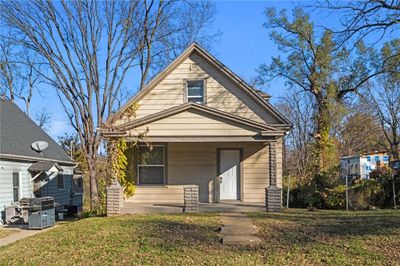 Bungalow-style house featuring a front lawn | Image 1