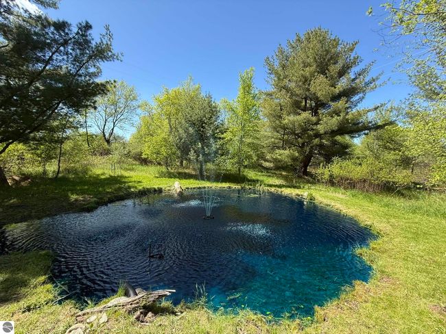 5867 Mabel Rd, House other with 5 bedrooms, 3 bathrooms and null parking in Williamsburg MI | Image 15