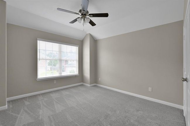 Bedroom 4 with ceiling fan. | Image 32