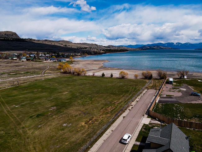 looking northeast, public road easement allows access to the lake | Image 4