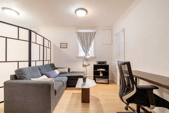 Office featuring crown molding and light wood-type flooring | Image 27