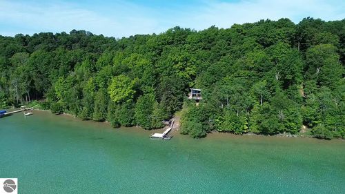 7681 N West Torch Lake Dr, Kewadin, MI, 49648-8944 | Card Image