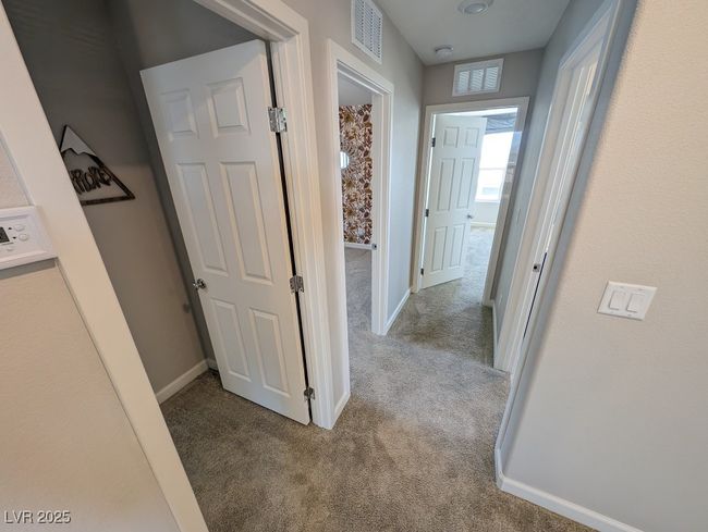 Hallway featuring carpet | Image 31