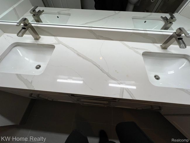 Carrara Marble double bowl sink w/ ample storage. | Image 18