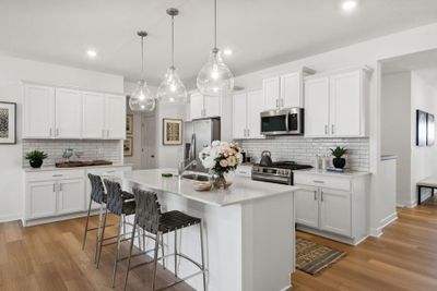 (Photo of a decorated model, actual homes finishes will vary) Imagine cooking a wonderful meal in this kitchen. | Image 3