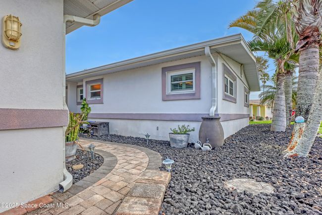 1061 Bali Rd, House other with 4 bedrooms, 2 bathrooms and null parking in Cocoa Beach FL | Image 5