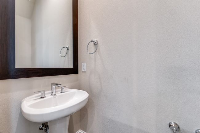 Bathroom featuring a sink | Image 30