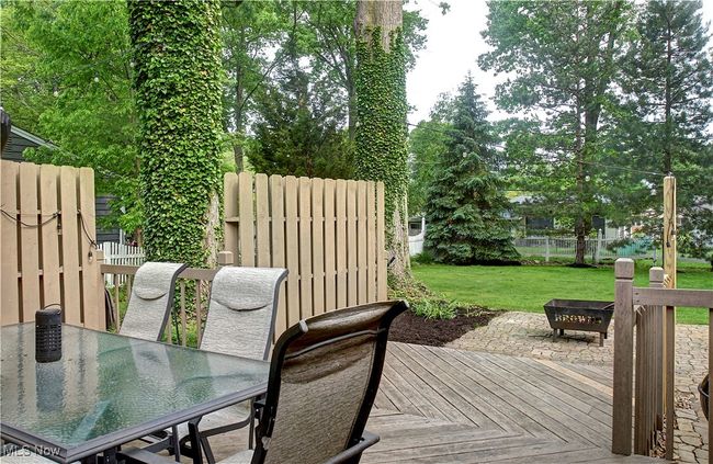 Wooden terrace with outdoor dining area | Image 39
