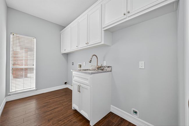 In-Home utility room with both electric and gas connections. Bonus, plenty of room for an upright fridge or feezer! | Image 20