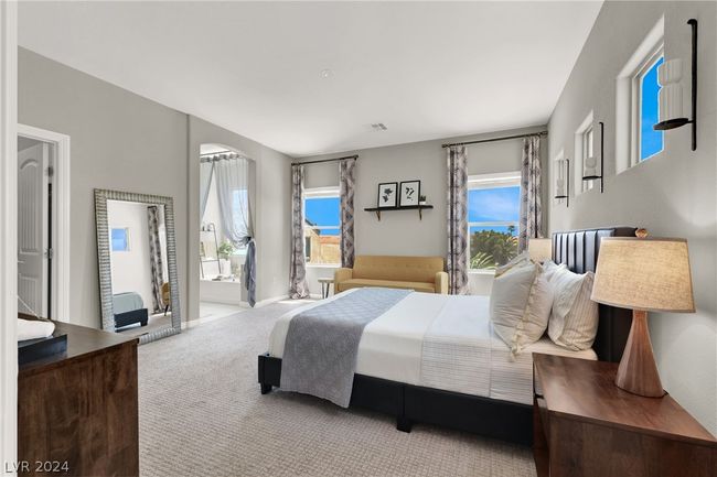 Primary bedroom overlooks backyard | Image 22