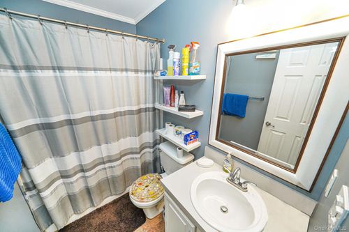 973 N Ocean Ave, Patchogue, NY, 11772-1106 | Card Image