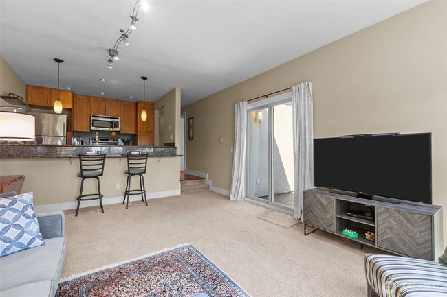 Loads of wall space for mounting a flat panel TV. | Image 11