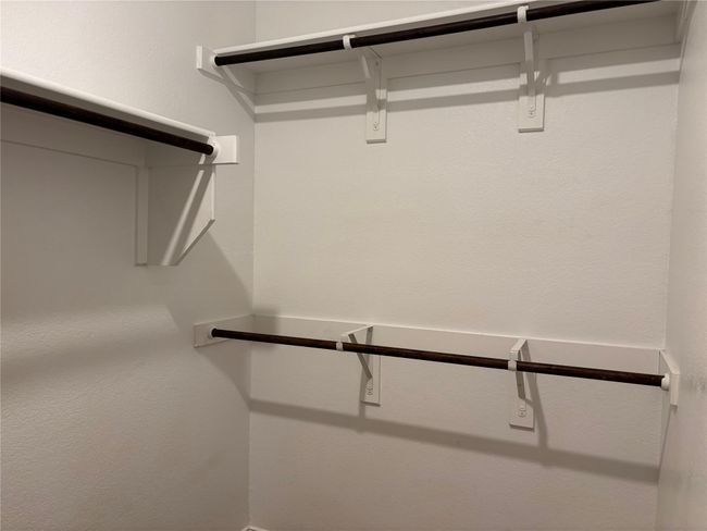 View of spacious closet | Image 14