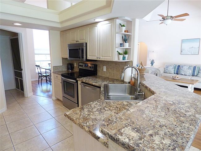 beautiful counter top and breakfast bar | Image 24