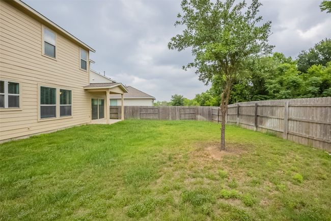 View of yard with a fenced backyard | Image 33