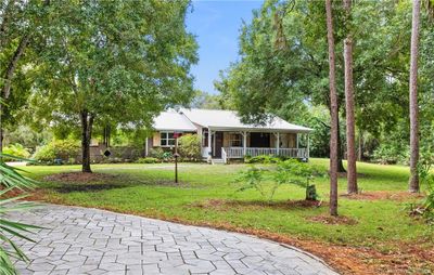 7370 Sw Rattlesnake Run, House other with 3 bedrooms, 2 bathrooms and 5 parking in Palm City FL | Image 3