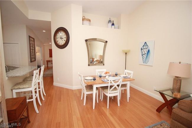 Dining area featuring light wood-type flooring | Image 8