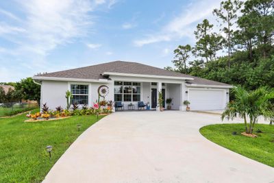 145 Sw Oakridge Drive, House other with 4 bedrooms, 3 bathrooms and null parking in Port St Lucie FL | Image 1