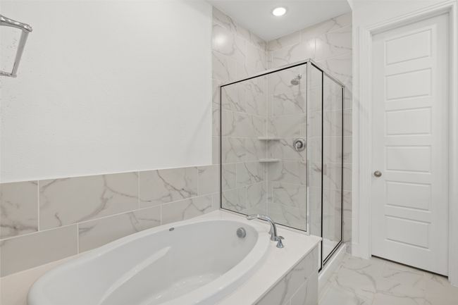 Full bath with a bath, marble finish floor, a stall shower, and recessed lighting | Image 22