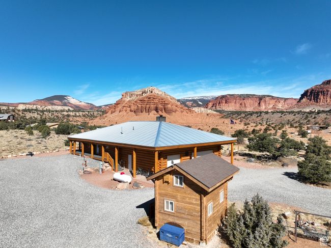 View of front of home with an outbuilding and a mountain view | Image 34