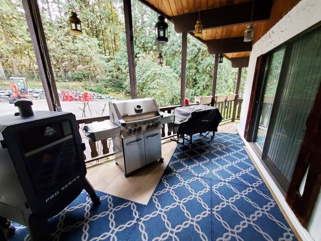View of patio featuring grilling area | Image 31