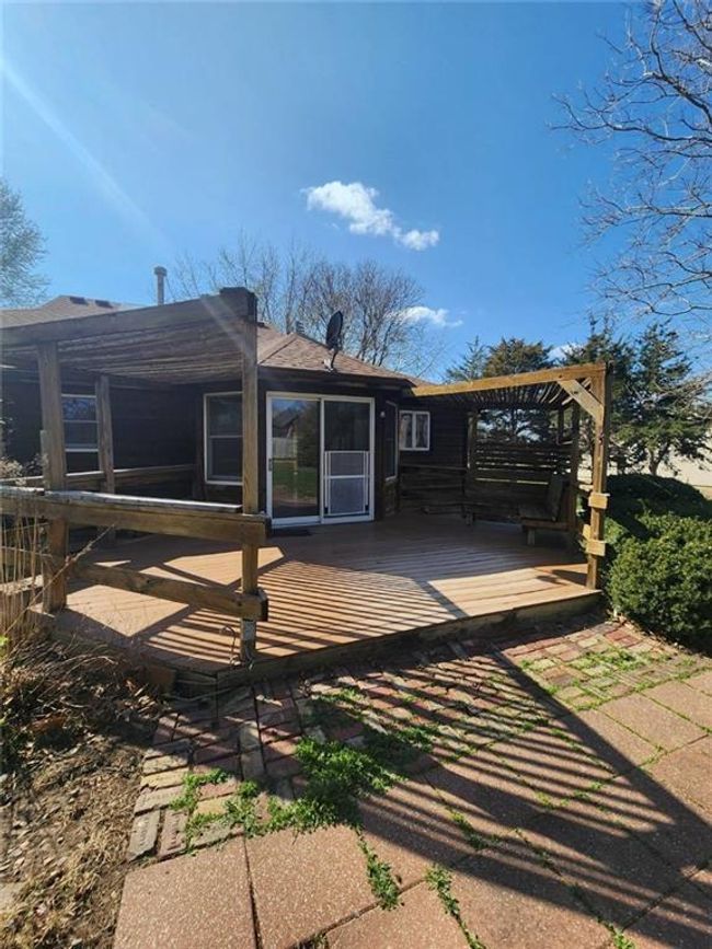 Back of property featuring a wooden deck | Image 9