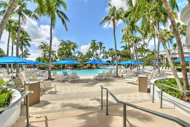 Pool featuring a patio area | Image 34
