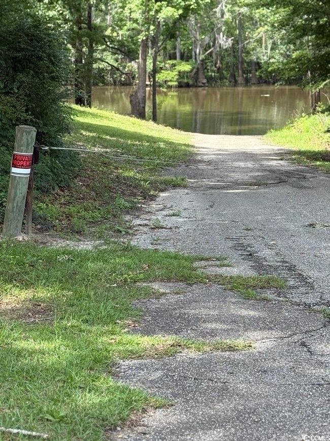 View of street featuring a water view | Image 39