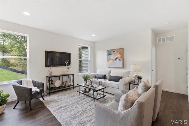 Living room with wood finished floors, baseboards, and recessed lighting | Image 12