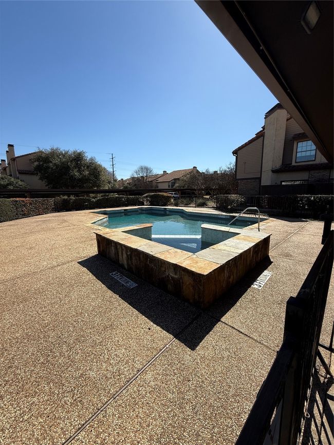 View of pool with a fenced in pool and a patio | Image 31